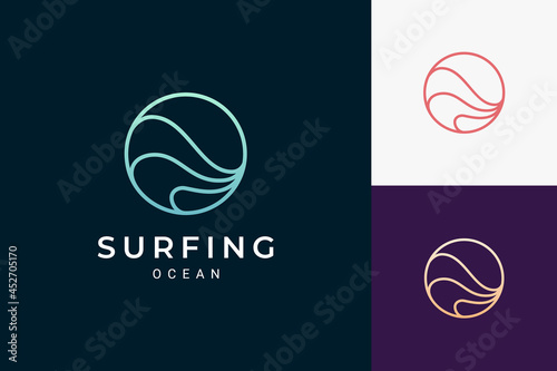 Valokuva Marine or water theme logo in simple ocean wave circle shape
