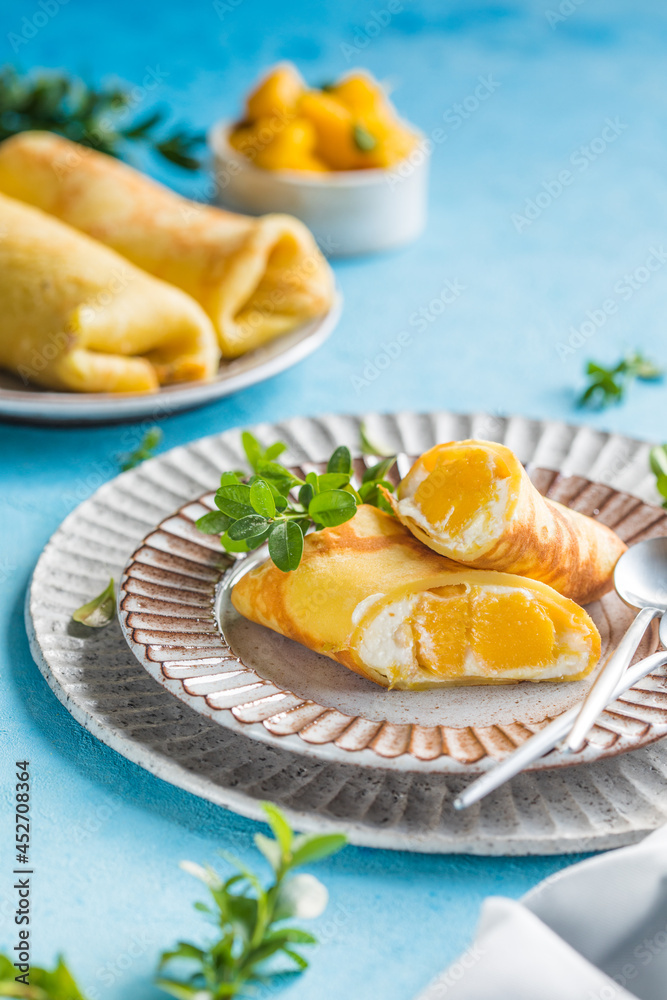 Sticky rice and mango crepe cake roll , .Hong Kong , Thai food style in summer