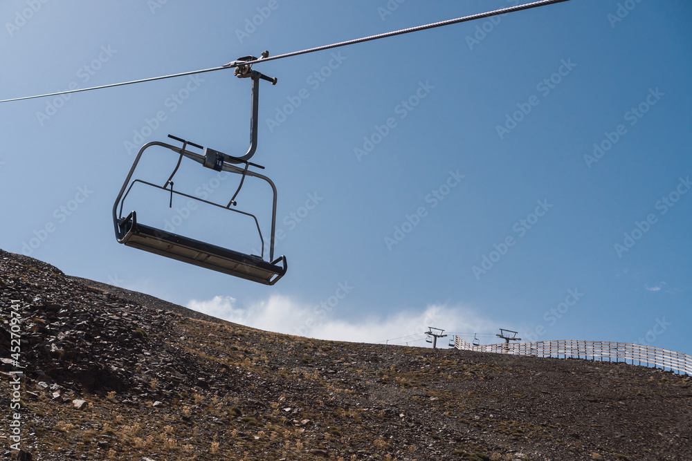 Lift lines in the ski resort of sierra nevada in granada. Ski lifts for winter sports in the mountains. horizontal photography.