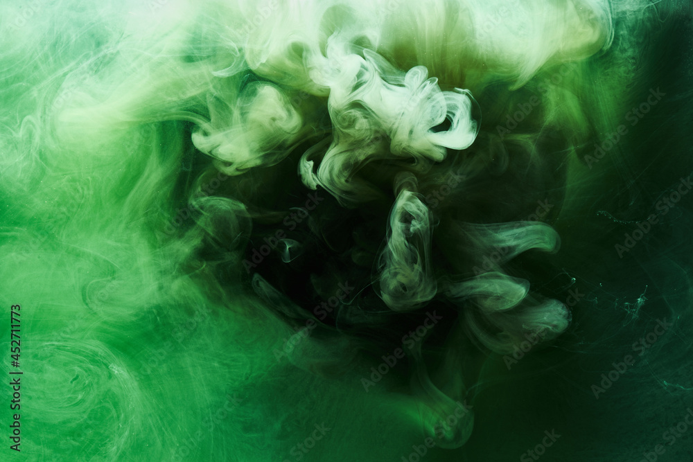 Fototapeta premium Abstract green color background. Swirling vibrant hookah smoke, underwater emerald ocean, dynamic paint in water