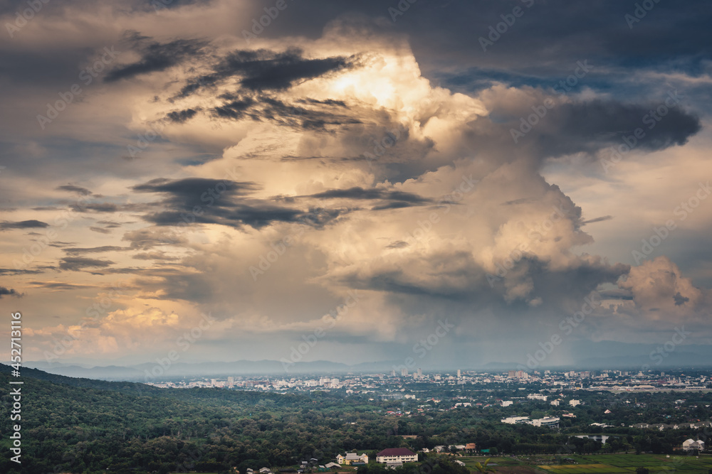 Landscape of Dramatic Cloudy Sky Over The City at Chiang Mai of Thailand, Stormy Atmosphere Weather Situation With Dramatic Clouds Sky at Evening Sunset. Natural Cloud Sky background.