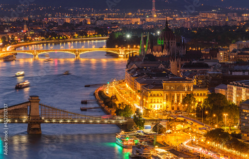 View of Budapest at night, Hungary. Parliament building, bridges and the Danube River. Landscape from above.