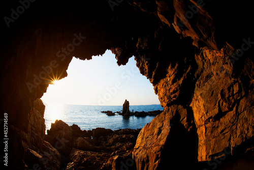 The cave with beautiful sunset view of the sea.