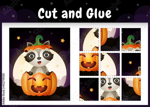 Children board game cut and glue with a cute raccoon in the halloween pumpkin