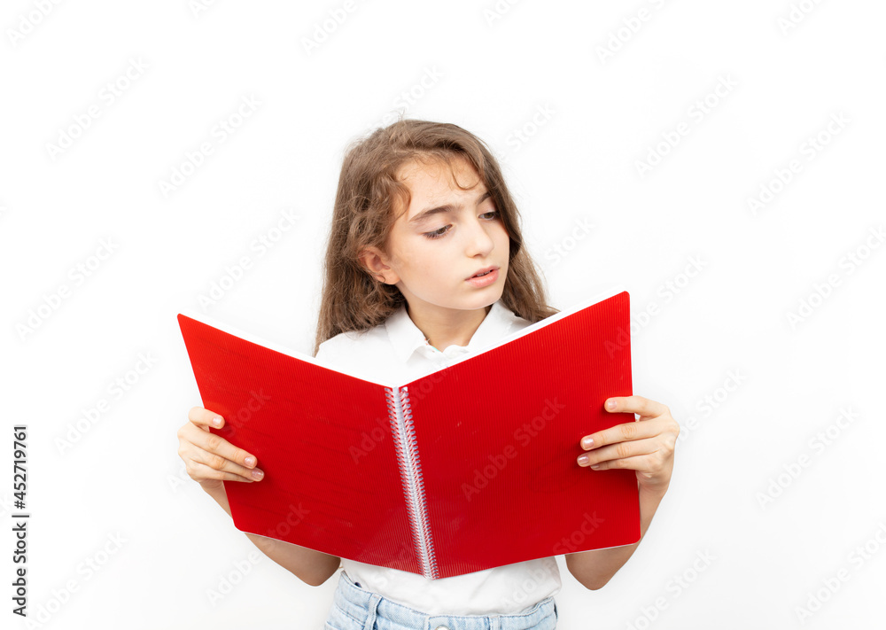 Kid reading book isolated on white background. Back to school. Kid reading book isolated on white background. Back to school.