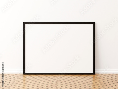Black horizontal frame mockup on the wooden floor. 3d rendering.