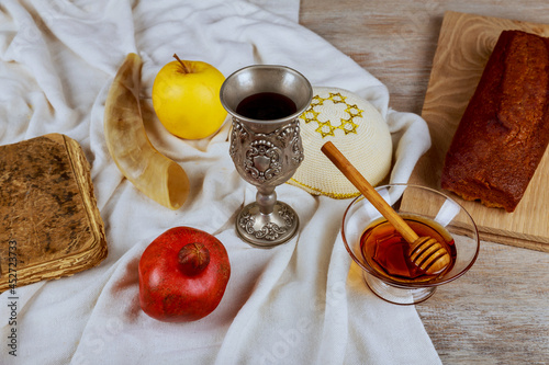 Are the symbols of Rosh hashanah Jewish New Year holiday on the table Synagogue photo