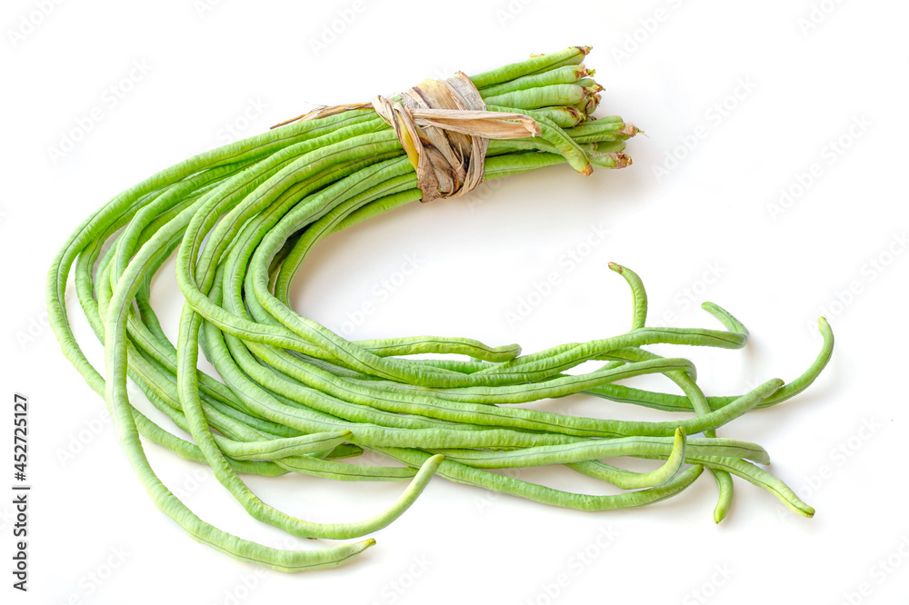 bundle of fresh long beans (Vigna unguiculata subsp. sesquipedalis) isolated on a white background bundle of fresh long beans (Vigna unguiculata subsp. sesquipedalis) isolated on a white background
