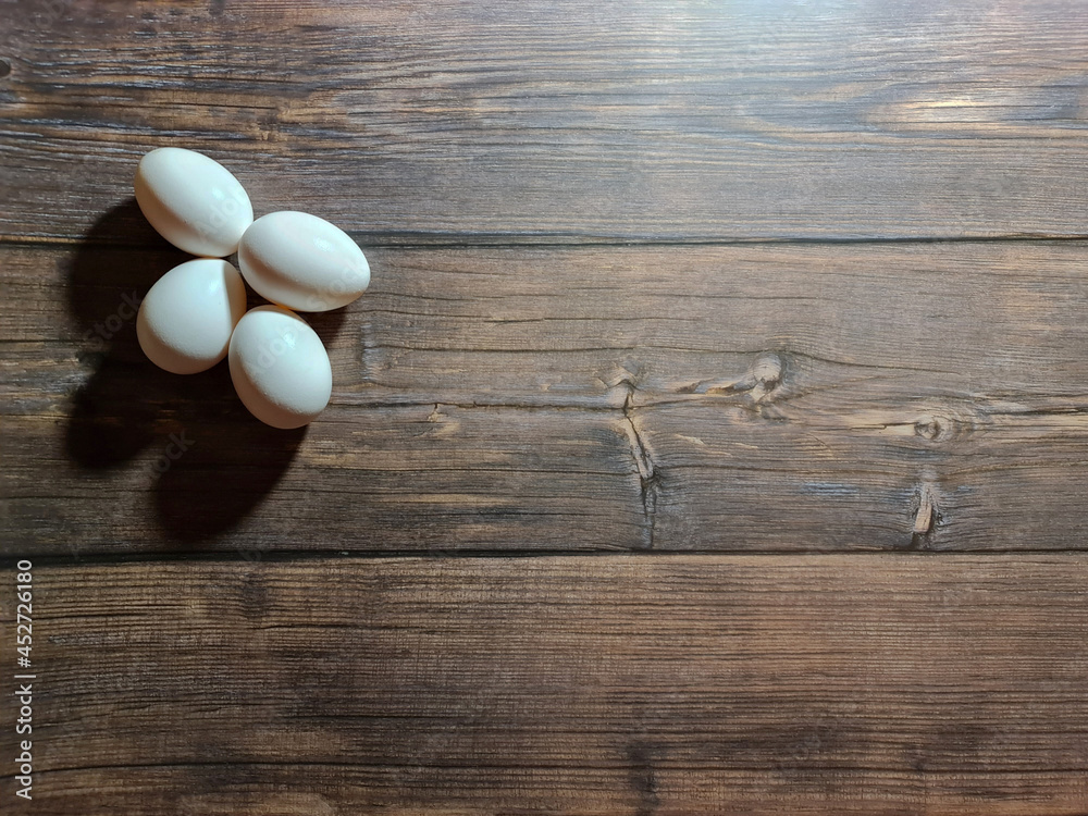 White chicken eggs. Eggs background. Chicken egg close-up.