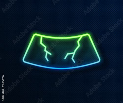 Glowing neon line Broken windshield cracked glass icon isolated on blue background. Vector