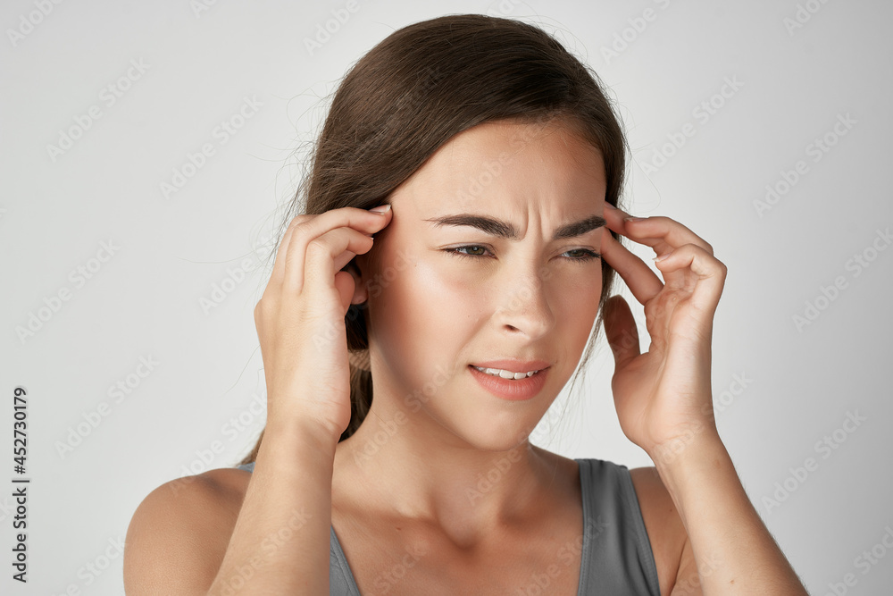 woman in t shirt health problems migraine pain close-up woman in t shirt health problems migraine pain close-up