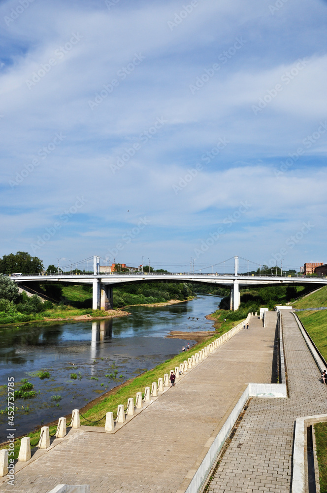 Fototapeta premium Panorama of the Dnieper embankment in Smolensk. River embankment and bridge over the river.