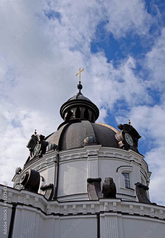 The belfry and the figure of Christ the Savior are new architectural elements of the surroundings and the Catholic Church of All Saints in the city of Białystok in Podlasie, Poland.