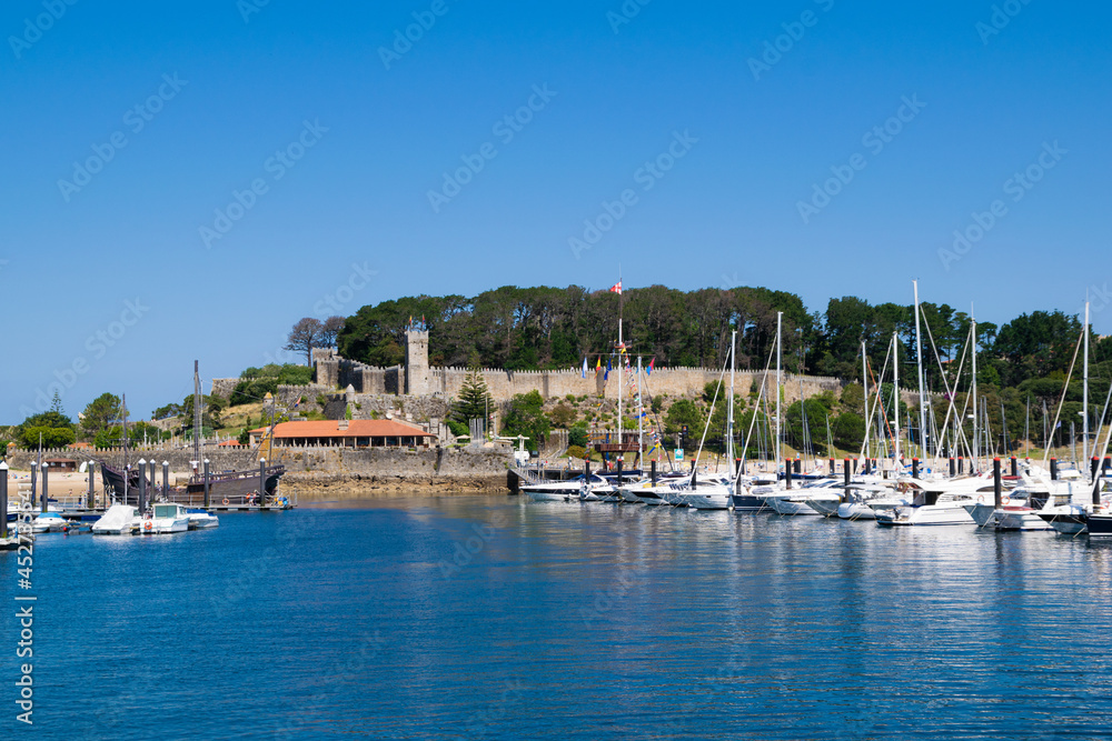 Panoramic view of the tourist parador of Baiona seen from the sea. Galicia - Spain