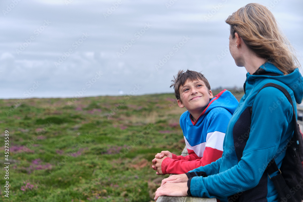Mother and preteen enjoying a day's holiday in nature Mother and preteen enjoying a day's holiday in nature