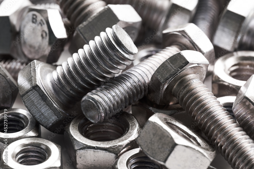 close-up steel nut screw background. group of steel metal nut and screw background. metal, fastener, bolt, iron, nut, screw close-up steel nut screw background. group of steel metal nut and screw background. metal, fastener, bolt, iron, nut, screw