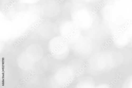 Abstract blur white and silver background with soft shimmer for display,White bokeh, abstract background