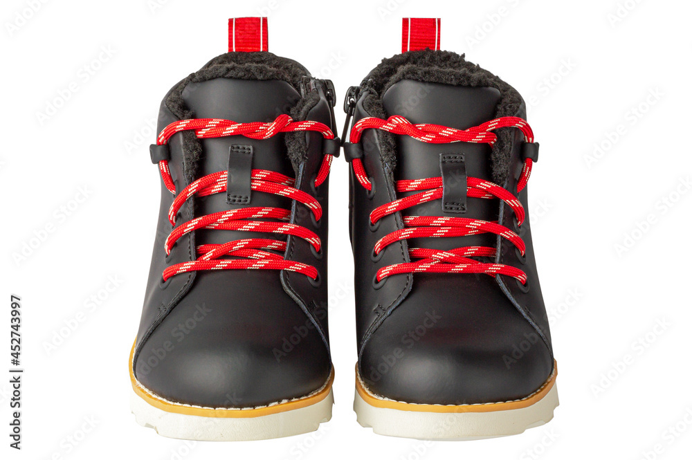 Black boots with red laces. Leather shoes on a white background. Isolate on white. Black boots with red laces. Leather shoes on a white background. Isolate on white.