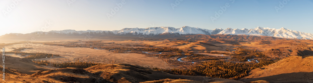 The natural scenery of Altai, Russia. Mountain landscape, winding river, dense forest. Autumn theme. Mountain panorama.