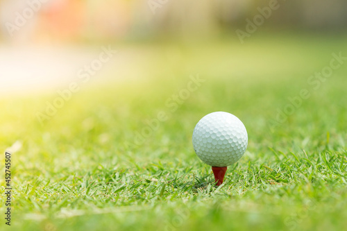 Close up of golf ball on tee,