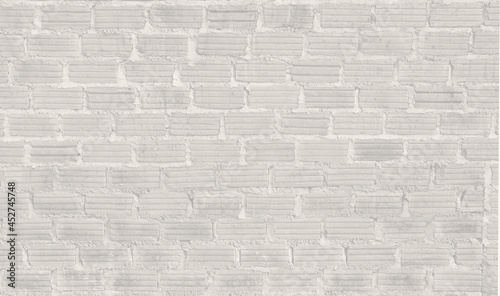 Pattern of painted white brick wall. Fired brick stucco background in rustic mood habitat. Exterior decoration made by rugged brickwork.