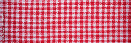 Red checkered kitchen linen or cloth. Panoramic image