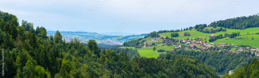 Panorama in the western Bernese Alps, a city in the mountains, concept of hiking in the mountains and vacation 