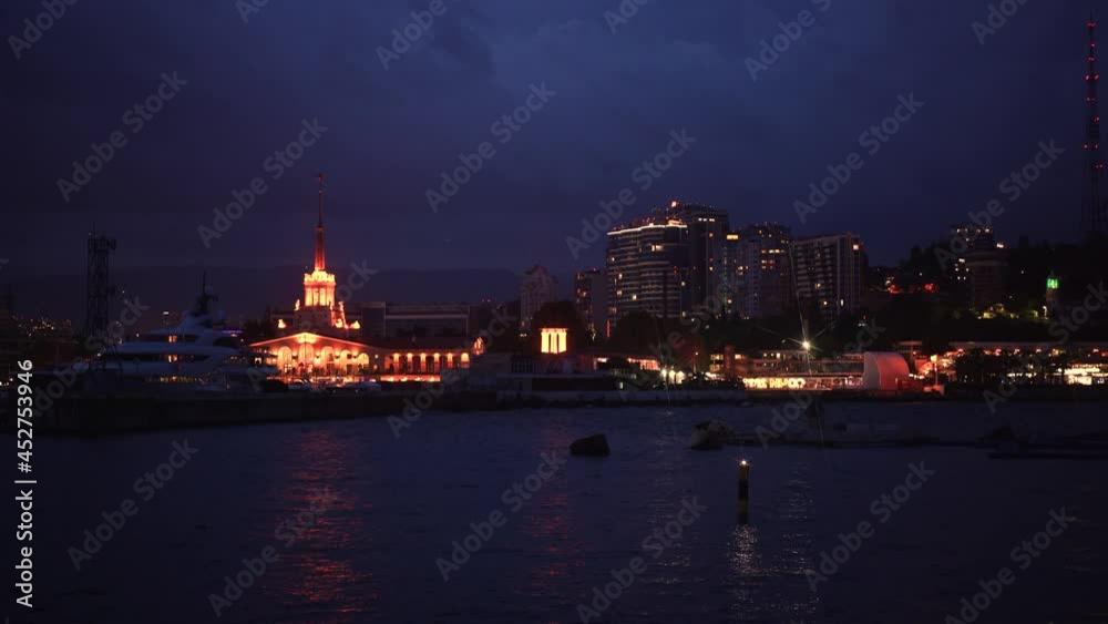 Beautiful night view of the Seaport of Sochi from the sea. Russia, 4k Beautiful night view of the Seaport of Sochi from the sea. Russia, 4k