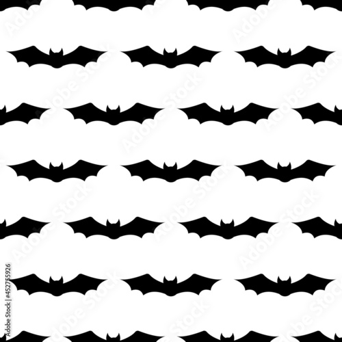 Seamless repeating pattern with Halloween symbols. Design of silhouettes for the holiday Halloween. for postcard  fabric  banner  template  wrapping paper. Vector flat illustration.