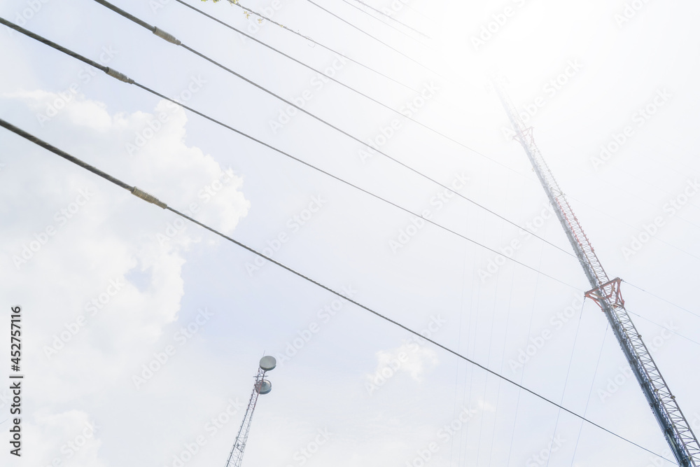 Telecommunication mast TV antennas in the afternoon ,on the hill blue sky with cloud bright at Phuket Thailand.