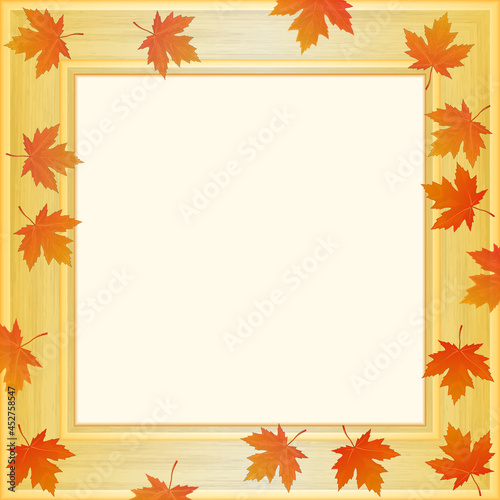 Wooden square frame with autumn leaves.