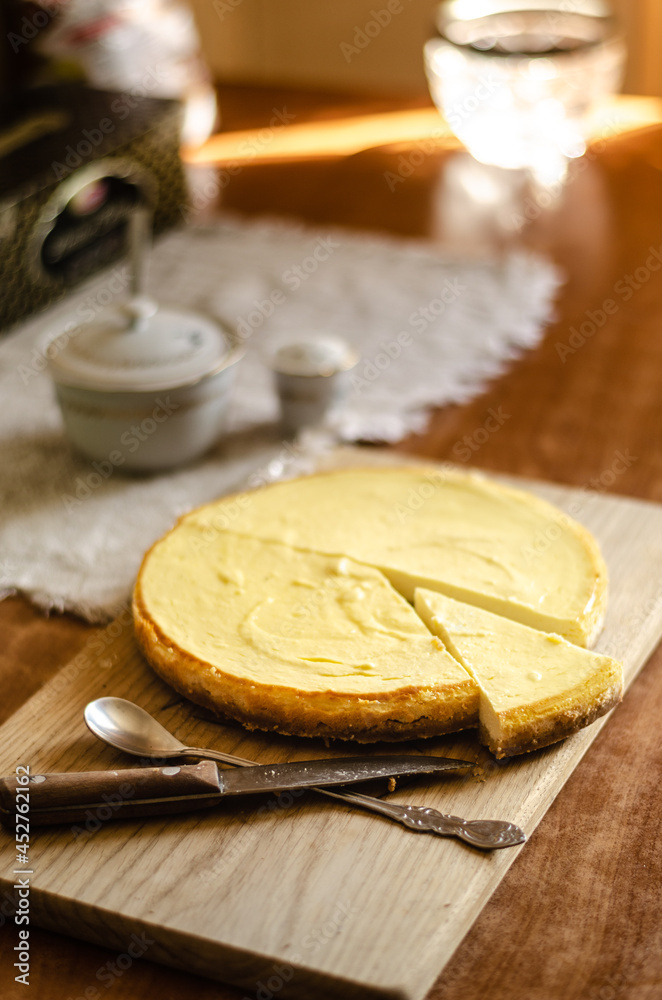 cheesecake on a wooden board on the table cheesecake on a wooden board on the table