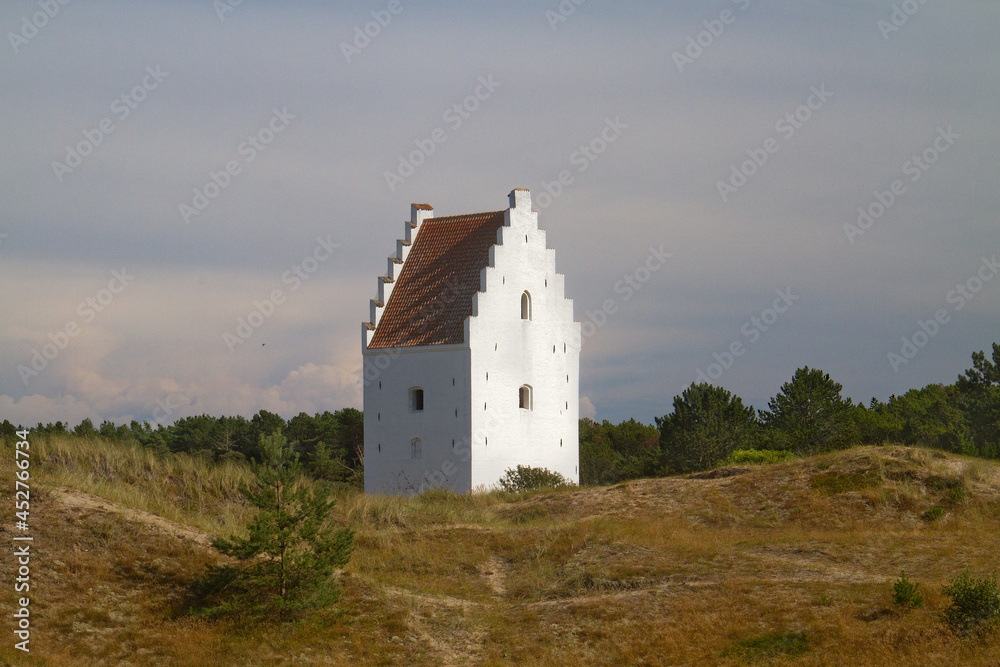 White tower in the dunes, the Sand-buried Church, Skagen, Denmark