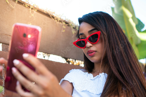 woman in sunglasses photo