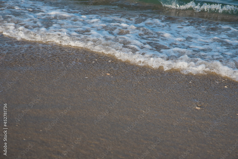 Sea or ocean tropical landscape view. Sea waves under the sun. Summer vacation and travel concept. Water wave surface. Sand beach. Sea or ocean tropical landscape view. Sea waves under the sun. Summer vacation and travel concept. Water wave surface. Sand beach.