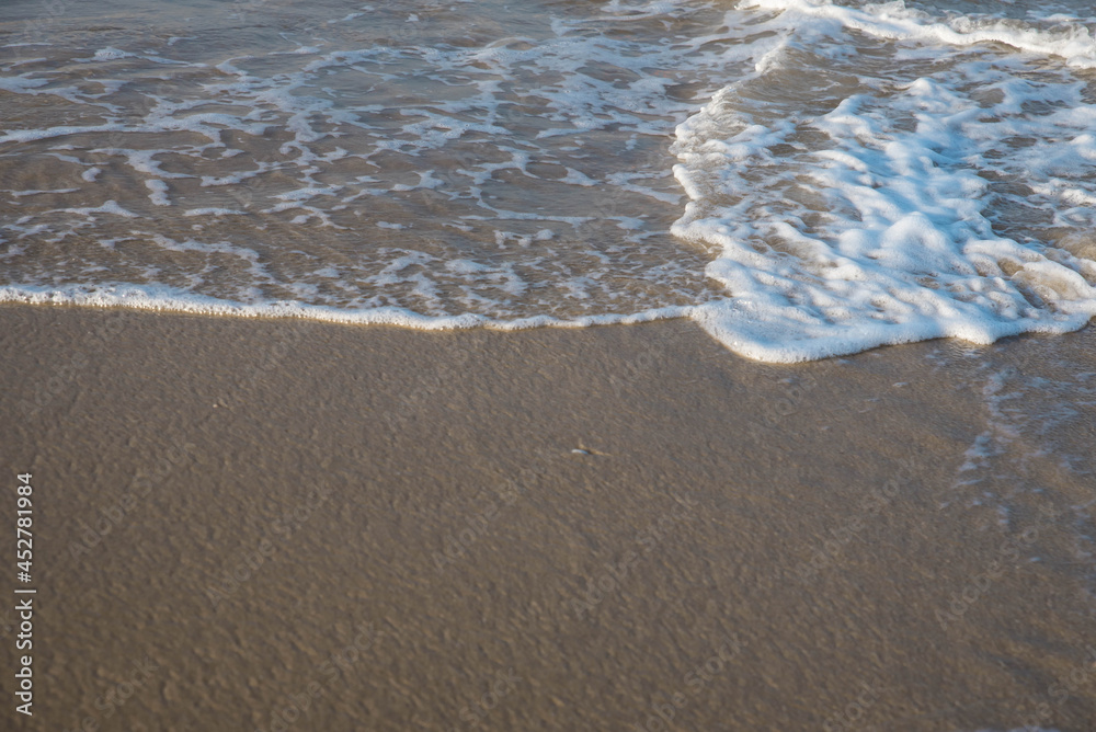 Sea or ocean tropical landscape view. Sea waves under the sun. Summer vacation and travel concept. Water wave surface. Sand beach. Sea or ocean tropical landscape view. Sea waves under the sun. Summer vacation and travel concept. Water wave surface. Sand beach.