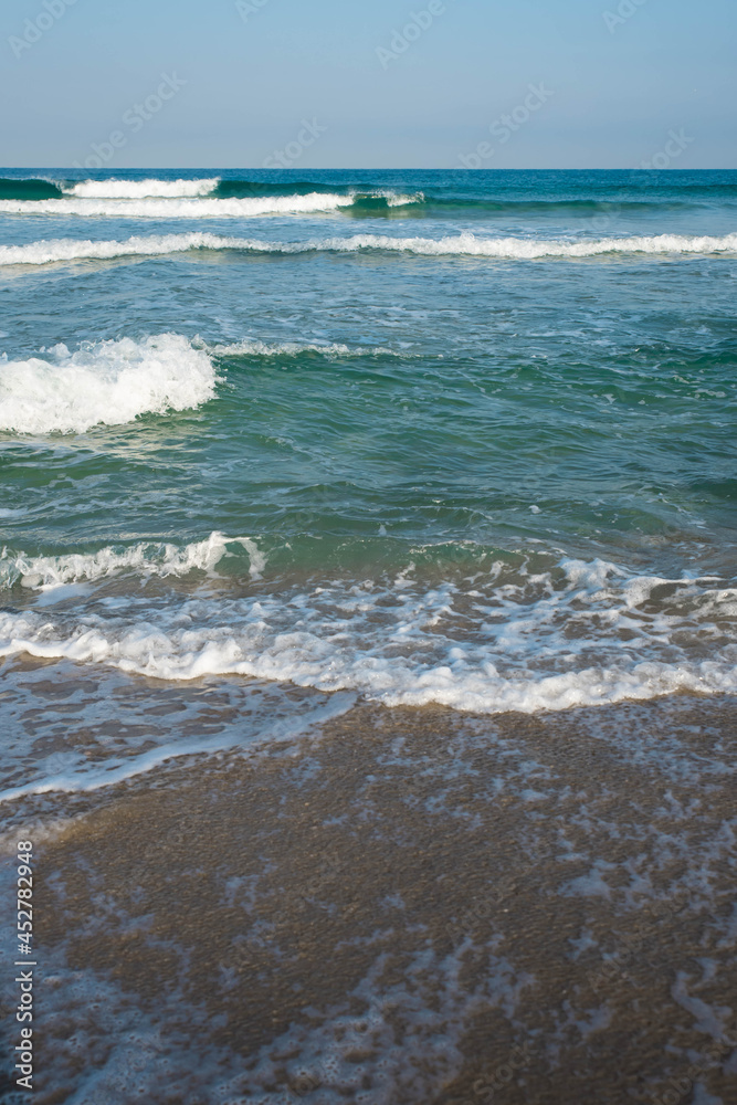 Sea or ocean tropical landscape view. Sea waves under the sun. Summer vacation and travel concept. Water wave surface. Sand beach. Sea or ocean tropical landscape view. Sea waves under the sun. Summer vacation and travel concept. Water wave surface. Sand beach.