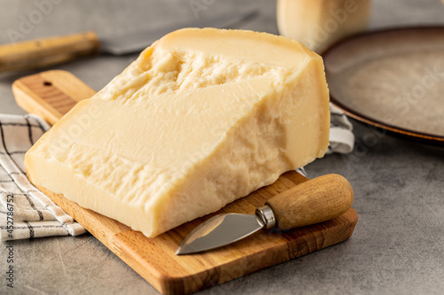 Block of italian parmesan cheese.