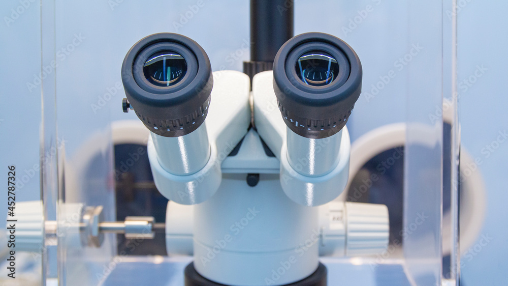 Stereo microscope in the laboratory, close up eyepieces, ocular