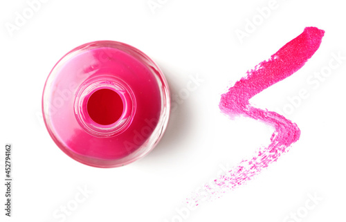 pink nail polish isolated on white background © KMNPhoto