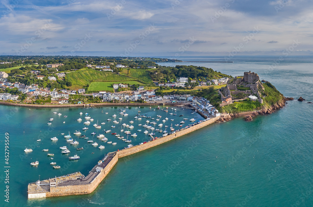 Drone aerial view of Gorey Harbour at high tide. Jersey, Channel Islands