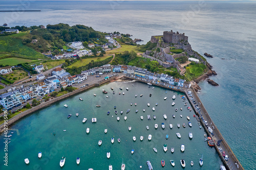 Drone aerial view of Gorey Harbour at high tide. Jersey, Channel Islands photo