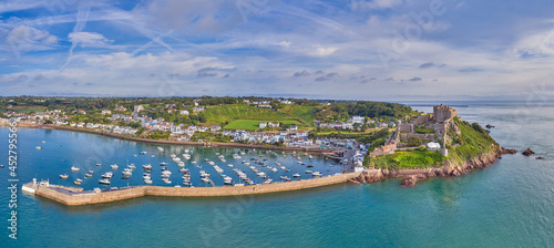 Panoramic drone aerial view of Gorey Harbour at high tide. Jersey, Channel Islands photo