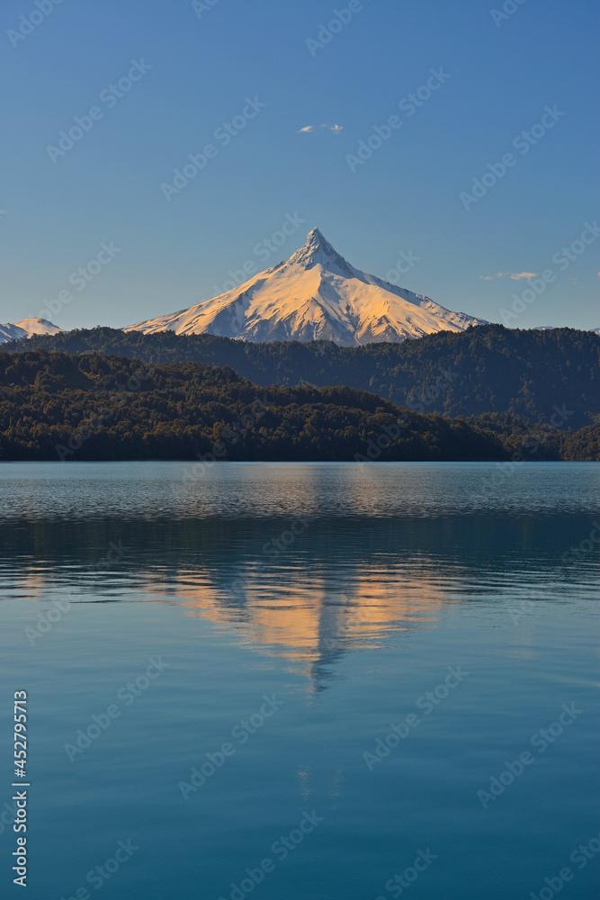 Reflection of the Puntiagudo volcano at sunset, Chile. 