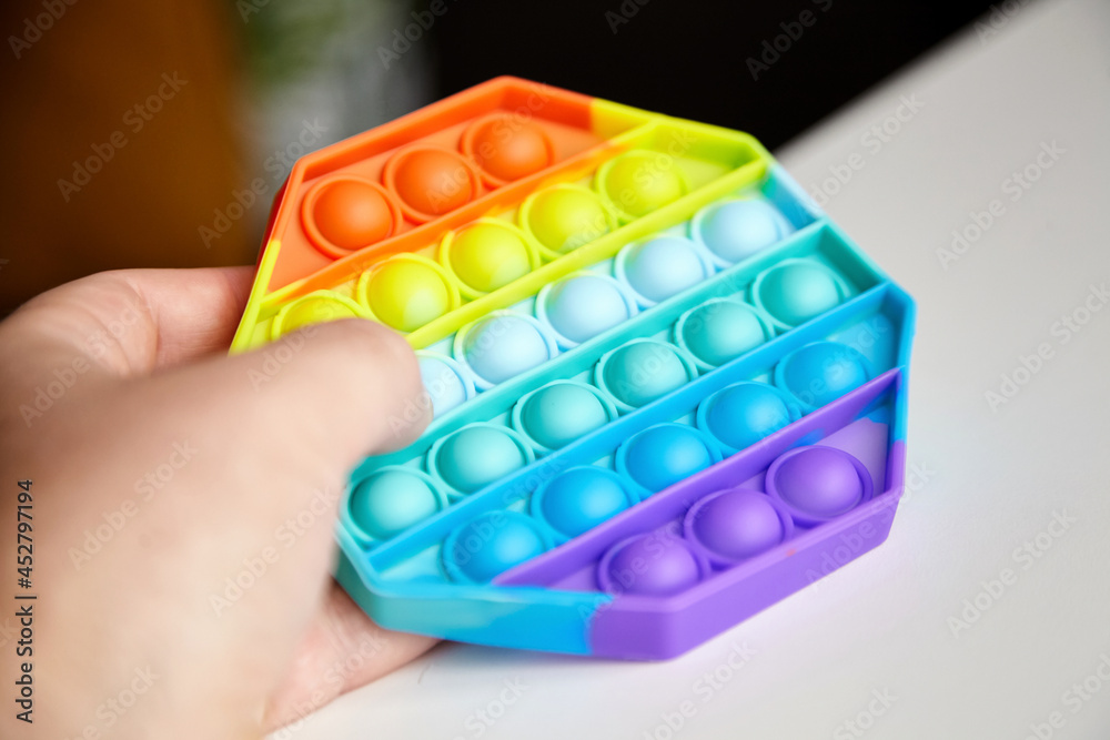 Push pop bubble sensory fidget toy in hand Push pop bubble sensory fidget toy in hand