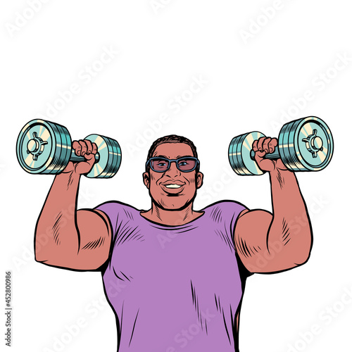 a black man lifts dumbbells, sports and health, morning exercises. Businessman daily routine