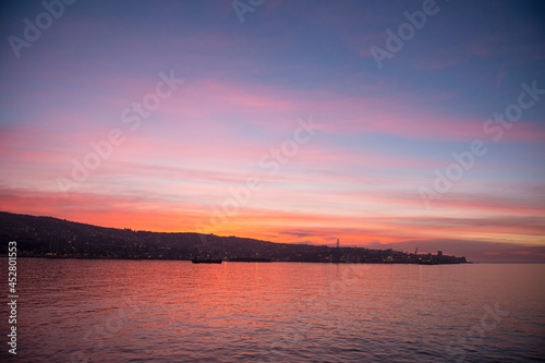 Sunset in Valpraiso city with harbor view and hills by Pacific Ocean  Chile.