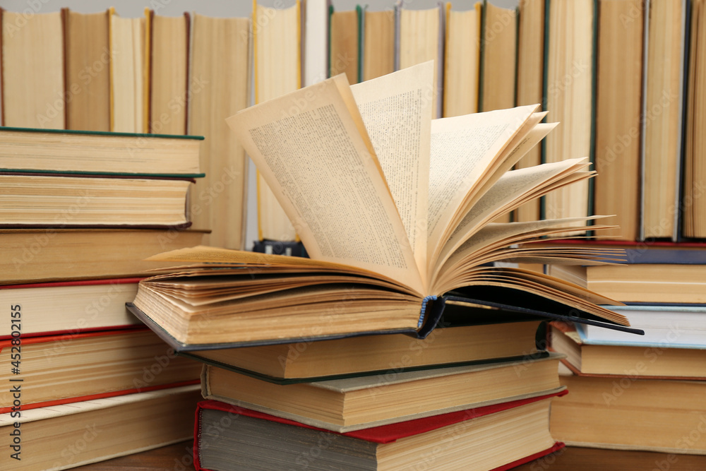 Naklejka premium Many hardcover books as background, closeup. Library material