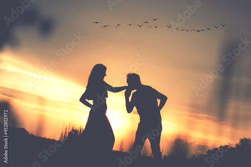 Happy couple at sunset