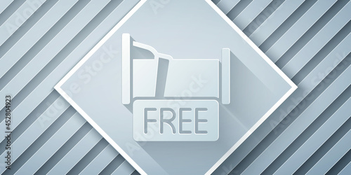 Paper cut Free overnight stay house icon isolated on grey background. Paper art style. Vector